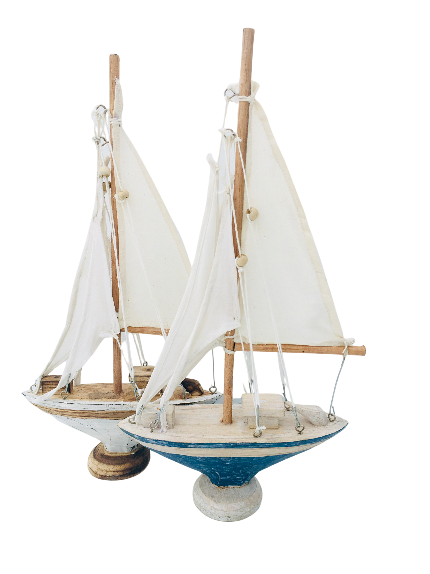 A wooden sailing yacht style boat. With a mast made out of white material material. Available in white or blue.