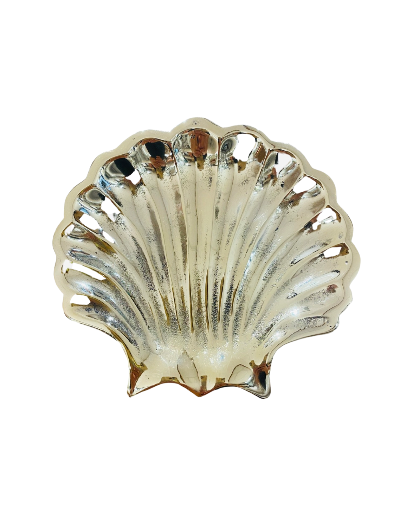 A clam shell style plate made of brass used to hold small objects