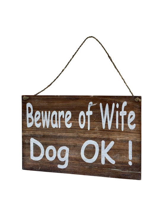 A wooden sign that says 'Beware of wife, dog ok"
