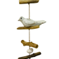 A wooden driftwood hanger with three birds, pebbles and driftwood pieces. Available with brown or white birds. 