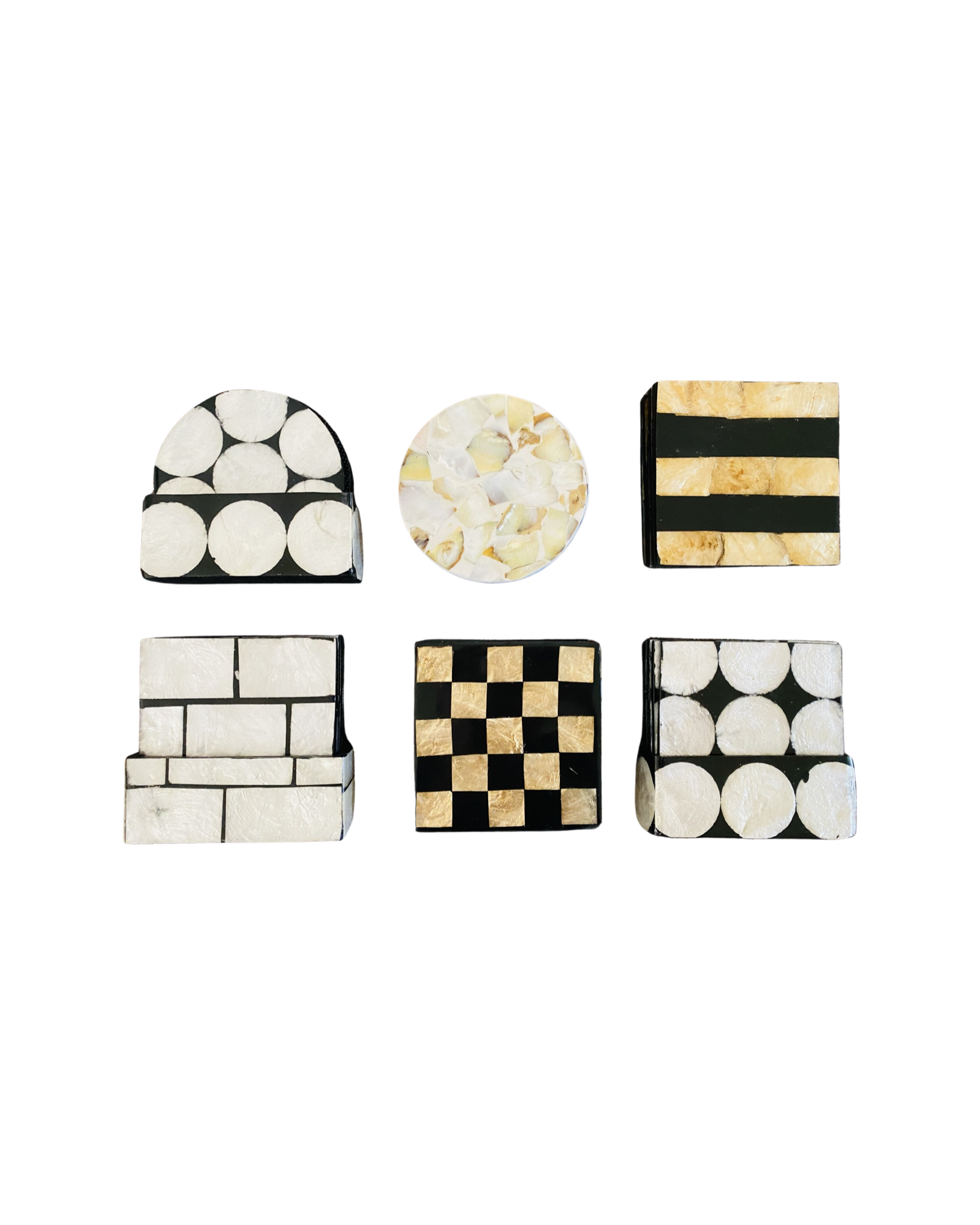 Various styles of round and square shaped shell inlay coasters. 