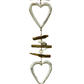 A hanger with three wooden painted white love hearts, white pebbles and driftwood pieces. 