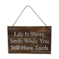 Life Is Short, Smile While You Still Have Teeth sign
