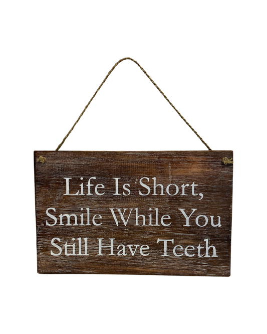 Life Is Short, Smile While You Still Have Teeth sign