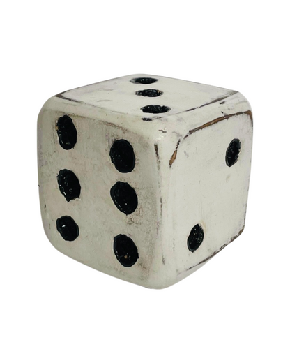 Large wooden classic dice in black and white. 