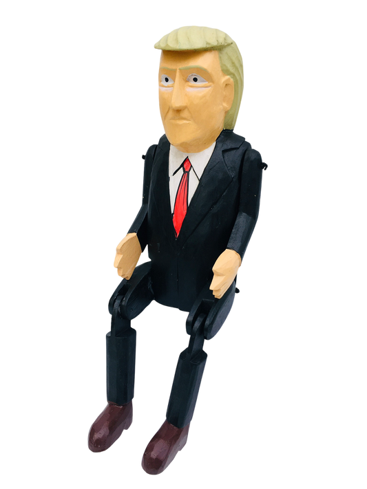 Wooden cartoon version of Donald Trump. 