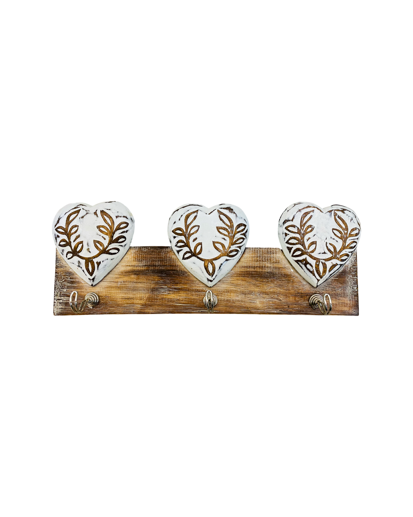 A hook hanger featuring three carved hearts and three hooks to hold your belongings 