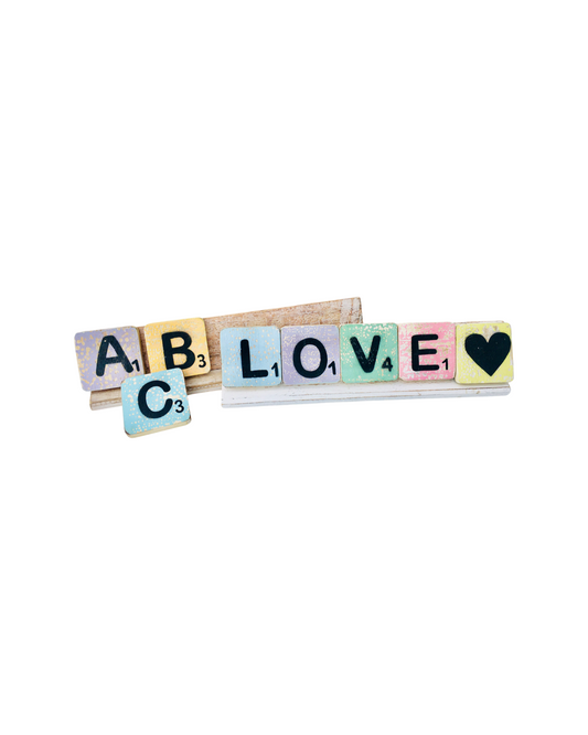 Board game style letters and stands to create any word you're looking for! Our letter are available in multiple different colours. And our stands come in either a natural or white wash finish. 