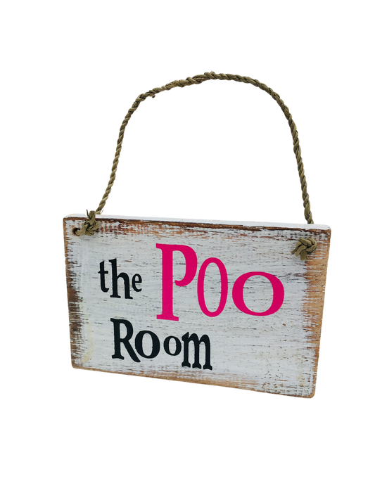 A small wooden sign that says 'The Poo Room".