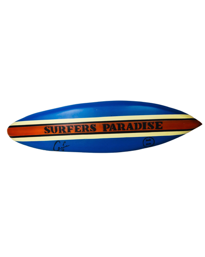 Solid mahogany surfboards with 'Surfers Paradise' writing. Available in grey, blue and natural. 