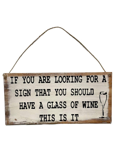 A wooden signs that says - 'If you are looking for a sign that you should have a glass of wine this is it". Available in white and brown. 