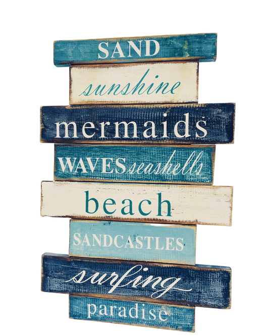 A rustic sign in white and different shades of blue that says - 'Sand, sunshine, mermaids, waves, seashells, beach, sandcastles, surfing, paradise. 